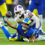 Dec 8, 2024; Inglewood, California, USA; Los Angeles Rams wide receiver Puka Nacua (17) attempts to catch the ball against Buffalo Bills cornerback Ja'Marcus Ingram (46) in the second half at SoFi Stadium. Mandatory Credit: Kirby Lee-Imagn Images
