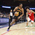 Dec 29, 2024; Oklahoma City, Oklahoma, USA; Oklahoma City Thunder forward Jalen Williams (8) drives around Memphis Grizzlies forward Jaylen Wells (0) during the second quarter at Paycom Center.