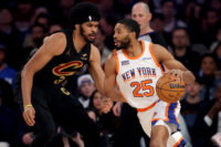 Apr 11, 2025; New York, New York, USA; New York Knicks forward Mikal Bridges (25) drives to the basket against Cleveland Cavaliers center Jarrett Allen (31) during the first quarter at Madison Square Garden. Mandatory Credit: