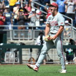 Jun 16, 2025; Omaha, Neb, USA; Arkansas Razorbacks starting pitcher Gage Wood (14) celebrates completing a no hitter against the Murray State Racers at Charles Schwab Field. Mandatory Credit: Steven Branscombe-Imagn Images