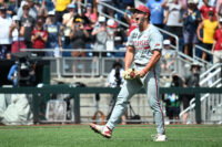Jun 16, 2025; Omaha, Neb, USA; Arkansas Razorbacks starting pitcher Gage Wood (14) celebrates completing a no hitter against the Murray State Racers at Charles Schwab Field. Mandatory Credit: Steven Branscombe-Imagn Images