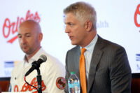 Nov 4, 2025; Baltimore, MD, USA; Right: President of Baseball Operations Mike Elias introduces Left: Craig Albernaz as the Baltimore Orioles new Manager at Warehouse Bar. Mandatory Credit: Daniel Kucin Jr.-Imagn Images