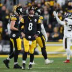 Pittsburgh Steelers quarterback Aaron Rodgers (8) looks on at the Jumbotron after his fumble resulted in a Houston Texans touchdown during the second half of the NFL Wild Card game at Acrisure Stadium in Pittsburgh, PA on January 12, 2026.