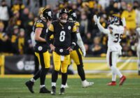 Pittsburgh Steelers quarterback Aaron Rodgers (8) looks on at the Jumbotron after his fumble resulted in a Houston Texans touchdown during the second half of the NFL Wild Card game at Acrisure Stadium in Pittsburgh, PA on January 12, 2026.
