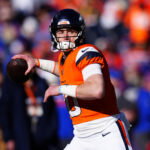 Jan 17, 2026; Denver, CO, USA; Denver Broncos quarterback Bo Nix (10) warms up before an AFC Divisional Round playoff game against the Buffalo Bills at Empower Field at Mile High. Mandatory Credit: Ron Chenoy-Imagn Images