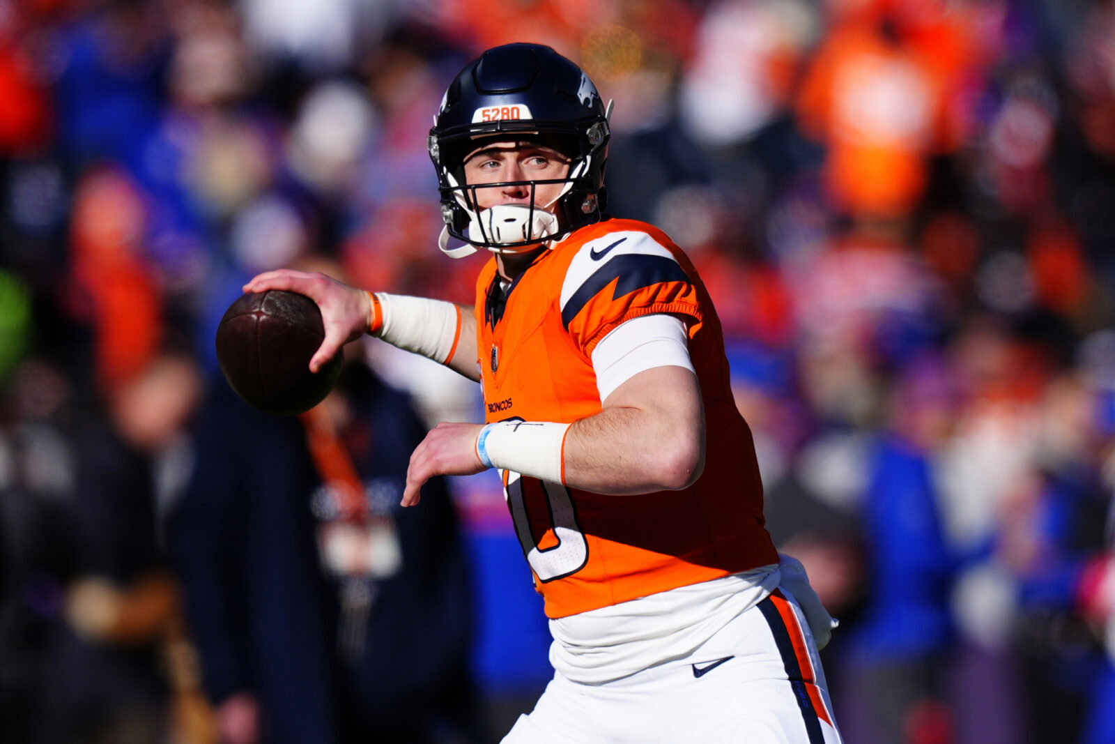 Jan 17, 2026; Denver, CO, USA; Denver Broncos quarterback Bo Nix (10) warms up before an AFC Divisional Round playoff game against the Buffalo Bills at Empower Field at Mile High. Mandatory Credit: Ron Chenoy-Imagn Images