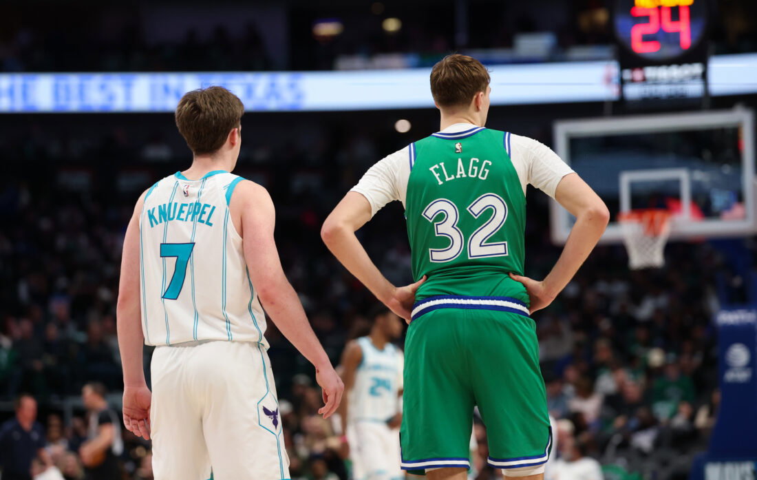 Jan 29, 2026; Dallas, Texas, USA; Charlotte Hornets guard Kon Knueppel (7) stands with Dallas Mavericks forward Cooper Flagg (32) during the second half at American Airlines Center. Mandatory Credit: Kevin Jairaj-Imagn Images