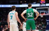 Jan 29, 2026; Dallas, Texas, USA; Charlotte Hornets guard Kon Knueppel (7) stands with Dallas Mavericks forward Cooper Flagg (32) during the second half at American Airlines Center. Mandatory Credit: Kevin Jairaj-Imagn Images