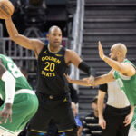 Feb 19, 2026; San Francisco, California, USA; Golden State Warriors center Al Horford (20) looks for an open teammate over Boston Celtics guard Derrick White (9) during the second quarter at Chase Center. Mandatory Credit: