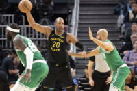 Feb 19, 2026; San Francisco, California, USA; Golden State Warriors center Al Horford (20) looks for an open teammate over Boston Celtics guard Derrick White (9) during the second quarter at Chase Center. Mandatory Credit: