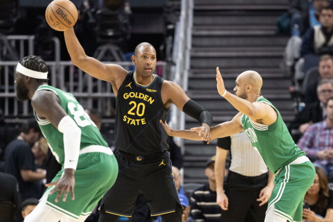 Feb 19, 2026; San Francisco, California, USA; Golden State Warriors center Al Horford (20) looks for an open teammate over Boston Celtics guard Derrick White (9) during the second quarter at Chase Center. Mandatory Credit: