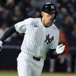 Feb 25, 2026; Tampa, Florida, USA; New York Yankees infielder George Lombard Jr (96) hits a two-RBI double during the fifth inning against the Washington Nationals at George M. Steinbrenner Field.