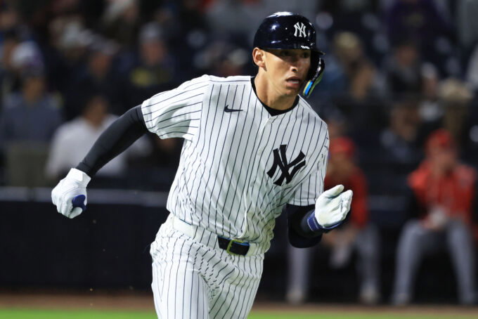 Feb 25, 2026; Tampa, Florida, USA; New York Yankees infielder George Lombard Jr (96) hits a two-RBI double during the fifth inning against the Washington Nationals at George M. Steinbrenner Field.