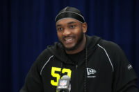 Feb 25, 2026; Indianapolis, IN, USA; Michigan defensive lineman Derrick Moore (DL52) speaks during the NFL Scouting Combine at the Indiana Convention Center. Mandatory Credit: Kirby Lee-Imagn Images