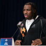 Feb 27, 2026; Indianapolis, IN, USA; Washington running back Jonah Coleman (RB04) speaks to members of the media during the NFL Combine at the Indiana Convention Center. Mandatory Credit: Jacob Musselman-Imagn Images