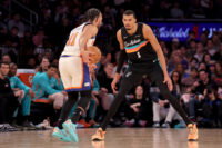 Mar 1, 2026; New York, New York, USA; San Antonio Spurs forward Victor Wembanyama (1) defends New York Knicks guard Jalen Brunson (11) during the third quarter at Madison Square Garden. Mandatory Credit: Brad Penner-Imagn Images