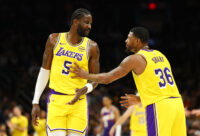 Feb 26, 2026; Phoenix, Arizona, USA; Los Angeles Lakers center Deandre Ayton (5) talks with guard Marcus Smart (36) against the Phoenix Suns at Mortgage Matchup Center. Mandatory Credit: Mark J. Rebilas-Imagn Images