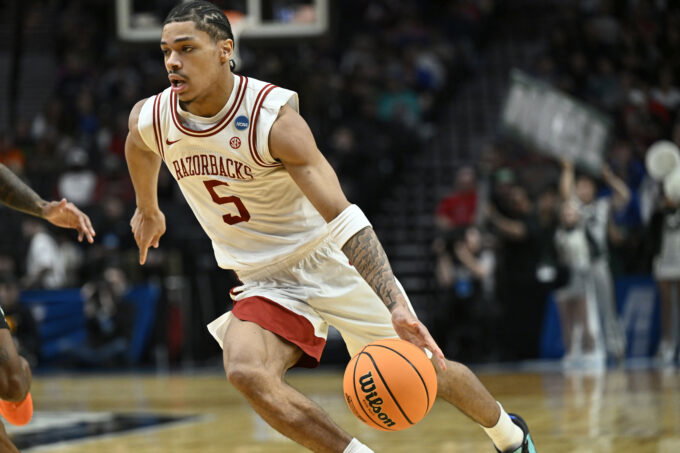 Mar 19, 2026; Portland, OR, USA; Arkansas Razorbacks guard Darius Acuff Jr. (5) drives against the Hawaii Rainbow Warriors in the second half during a first round game of the men's 2026 NCAA Tournament at Moda Center. Mandatory Credit: Craig Strobeck-Imagn Images