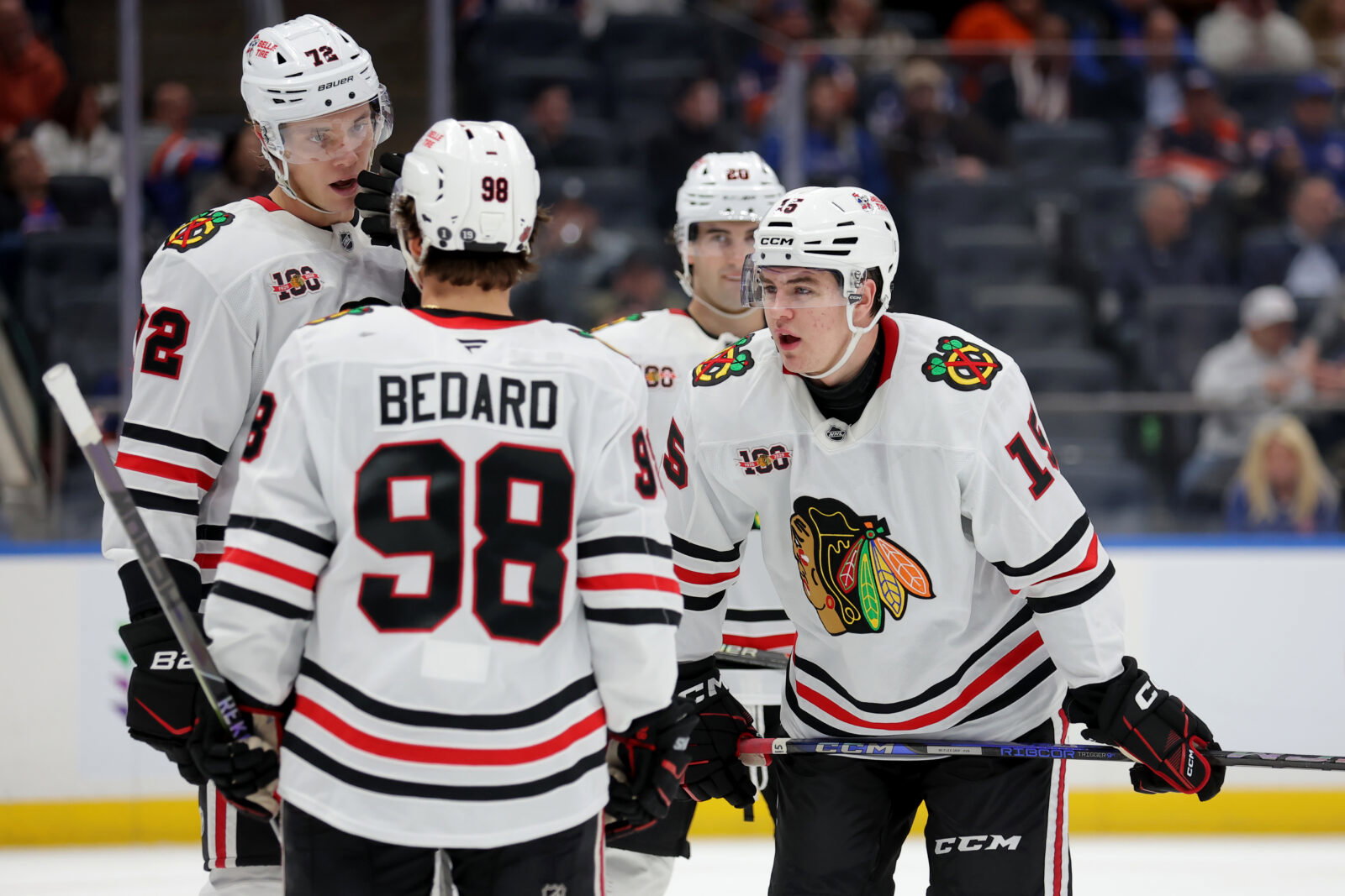 Mar 24, 2026; Elmont, New York, USA; Chicago Blackhawks center Anton Frondell (15) talks to center Connor Bedard (98) and defenseman Alex Vlasic (72) during the third period at UBS Arena. Mandatory Credit: Brad Penner-Imagn Images