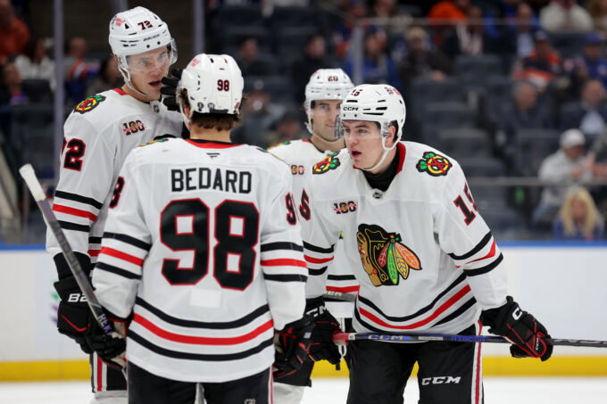 Mar 24, 2026; Elmont, New York, USA; Chicago Blackhawks center Anton Frondell (15) talks to center Connor Bedard (98) and defenseman Alex Vlasic (72) during the third period at UBS Arena. Mandatory Credit: Brad Penner-Imagn Images