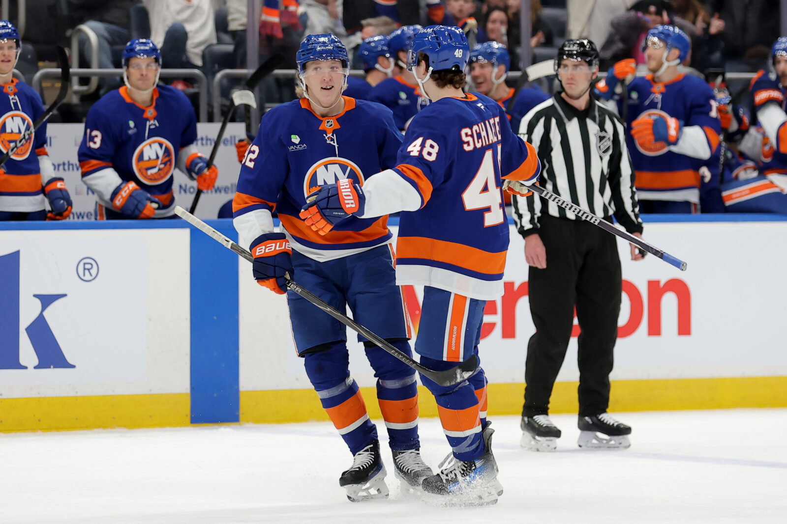 Mar 28, 2026; Elmont, New York, USA; New York Islanders right wing Simon Holmstrom (92) celebrates his goal against the Florida Panthers with defenseman Matthew Schaefer (48) during the second period at UBS Arena. Mandatory Credit: Brad Penner-Imagn Images