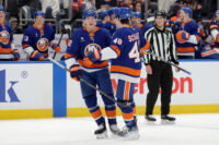 Mar 28, 2026; Elmont, New York, USA; New York Islanders right wing Simon Holmstrom (92) celebrates his goal against the Florida Panthers with defenseman Matthew Schaefer (48) during the second period at UBS Arena. Mandatory Credit: Brad Penner-Imagn Images