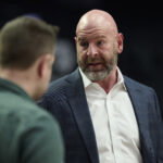 Apr 2, 2026; Portland, Oregon, USA; Portland Trail Blazers GM Joe Cronin visits courtside before a game between the Portland Trail Blazers and the New Orleans Pelicans at Moda Center. Mandatory Credit: Troy Wayrynen-Imagn Images
