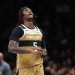Apr 5, 2026; Brooklyn, New York, USA; Washington Wizards guard Jamir Watkins (5) reacts after making a three point basket during the second half against the Brooklyn Nets at Barclays Center. Mandatory Credit: Vincent Carchietta-Imagn Images