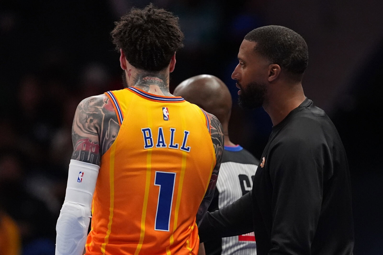 Apr 10, 2026; Charlotte, North Carolina, USA; Charlotte Hornets Head Coach Charles Lee talks with guard LaMelo Ball (1) during a time out during first quarter against the Detroit Pistons at Spectrum Center. Mandatory Credit: Jim Dedmon-Imagn Images