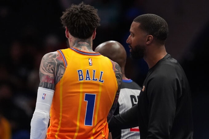 Apr 10, 2026; Charlotte, North Carolina, USA; Charlotte Hornets Head Coach Charles Lee talks with guard LaMelo Ball (1) during a time out during first quarter against the Detroit Pistons at Spectrum Center. Mandatory Credit: Jim Dedmon-Imagn Images