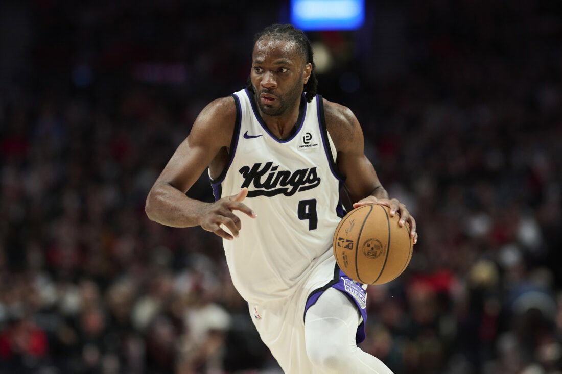 Apr 12, 2026; Portland, Oregon, USA; Sacramento Kings forward Precious Achiuwa (9) drives to the basket during the second half against the Portland Trail Blazers at Moda Center. Mandatory Credit: Troy Wayrynen-Imagn Images