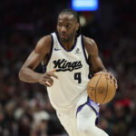 Apr 12, 2026; Portland, Oregon, USA; Sacramento Kings forward Precious Achiuwa (9) drives to the basket during the second half against the Portland Trail Blazers at Moda Center. Mandatory Credit: Troy Wayrynen-Imagn Images