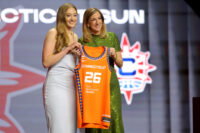 Apr 13, 2026; New York, NY, USA; WNBA Commissioner Cathy Engelbert (right) poses for photos with Gianna Kneepkens who was selected fifteenth overall by the Connecticut Sun during the 2026 WNBA Draft at The Shed at Hudson Yards. Mandatory Credit: