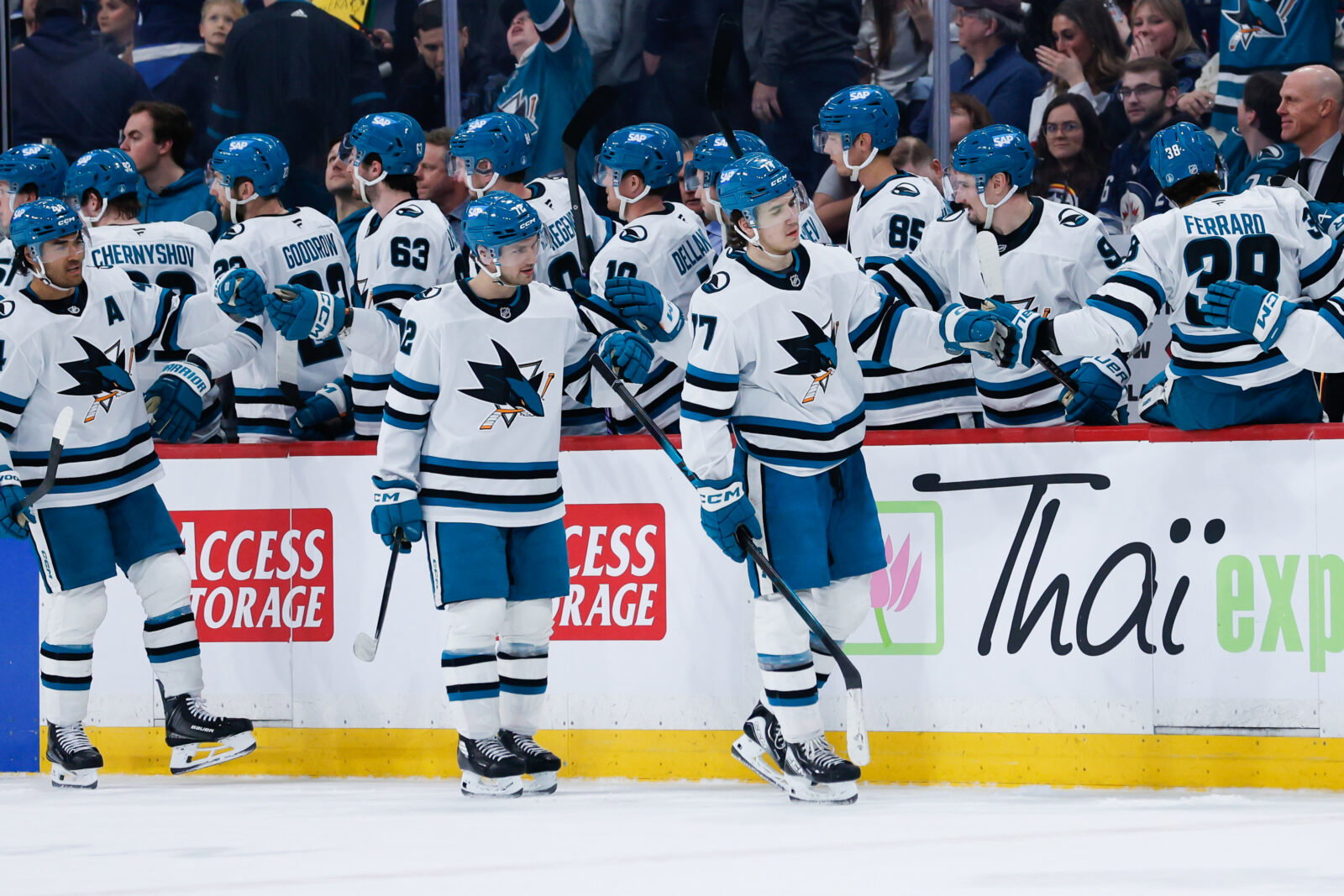 Apr 16, 2026; Winnipeg, Manitoba, CAN; San Jose Sharks forward Michael Misa (77) is congratulated by his team mates on his goal against the Winnipeg Jets during the second period at Canada Life Centre. Mandatory Credit: Terrence Lee-Imagn Images