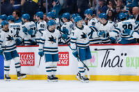 Apr 16, 2026; Winnipeg, Manitoba, CAN; San Jose Sharks forward Michael Misa (77) is congratulated by his team mates on his goal against the Winnipeg Jets during the second period at Canada Life Centre. Mandatory Credit: Terrence Lee-Imagn Images
