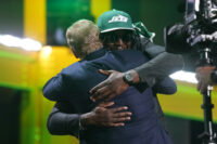 Apr 23, 2026; Pittsburgh, PA, USA; Texas Tech Red Raiders linebacker David Bailey embraces NFL commissioner Roger Goodell after he is selected by the New York Jets as the number two pick during the 2026 NFL Draft at Acrisure Stadium. Mandatory Credit: Kirby Lee-Imagn Images