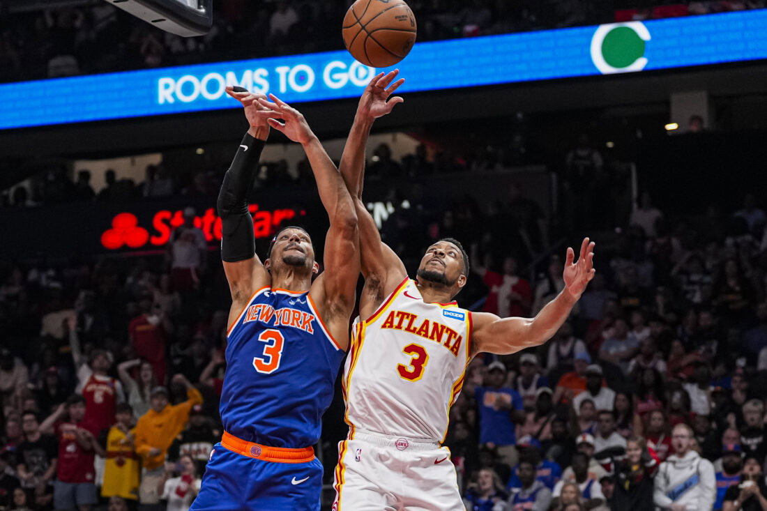 Apr 25, 2026; Atlanta, Georgia, USA; New York Knicks guard Josh Hart (3) and Atlanta Hawks guard CJ McCollum (3) fight for a rebound during the second half during game four of the first round of the 2026 NBA Playoffs at State Farm Arena. Mandatory Credit: Dale Zanine-Imagn Images