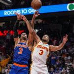 Apr 25, 2026; Atlanta, Georgia, USA; New York Knicks guard Josh Hart (3) and Atlanta Hawks guard CJ McCollum (3) fight for a rebound during the second half during game four of the first round of the 2026 NBA Playoffs at State Farm Arena. Mandatory Credit: Dale Zanine-Imagn Images