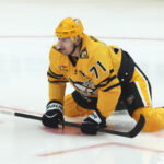 Apr 27, 2026; Pittsburgh, Pennsylvania, USA; Pittsburgh Penguins center Evgeni Malkin (71) stretches on the ice to warm up against the Philadelphia Flyers in game five of the first round of the 2026 Stanley Cup Playoffs at PPG Paints Arena. Mandatory Credit: Charles LeClaire-Imagn Images