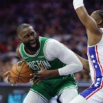 Apr 30, 2026; Philadelphia, Pennsylvania, USA; Boston Celtics guard Jaylen Brown (7) drives against Philadelphia 76ers guard Tyrese Maxey (0) during the second quarter at Xfinity Mobile Arena. Mandatory Credit:
