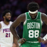 Apr 30, 2026; Philadelphia, Pennsylvania, USA; Boston Celtics center Neemias Queta (88) looks on in front of Philadelphia 76ers center Joel Embiid (21) during the third quarter at Xfinity Mobile Arena. Mandatory Credit: Bill Streicher-Imagn Images
