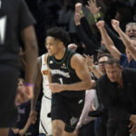 Apr 30, 2026; Minneapolis, Minnesota, USA; Minnesota Timberwolves guard Terrence Shannon Jr. (1) celebrates making a shot against the Denver Nuggets in the second half during game six of the first round of the 2026 NBA Playoffs at Target Center. Mandatory Credit: Jesse Johnson-Imagn Images