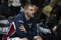 Apr 30, 2026; Minneapolis, Minnesota, USA; Denver Nuggets center Nikola Jokic (15) seats on the bench before the second half begins against the Minnesota Timberwolves during game six of the first round of the 2026 NBA Playoffs at Target Center. Mandatory Credit: Jesse Johnson-Imagn Images