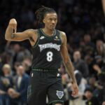Apr 30, 2026; Minneapolis, Minnesota, USA; Minnesota Timberwolves guard Bones Hyland (8) celebrates making a shot against the Denver Nuggets in the first half during game six of the first round of the 2026 NBA Playoffs at Target Center. Mandatory Credit: Jesse Johnson-Imagn Images