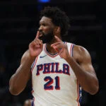 May 2, 2026; Boston, Massachusetts, USA; Philadelphia 76ers center Joel Embiid (21) silences the crowd after making a shot against the Boston Celtics during the second quarter of game seven of the first round of the 2026 NBA Playoffs at TD Garden. Mandatory Credit: Winslow Townson-Imagn Images