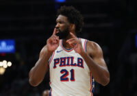 May 2, 2026; Boston, Massachusetts, USA; Philadelphia 76ers center Joel Embiid (21) silences the crowd after making a shot against the Boston Celtics during the second quarter of game seven of the first round of the 2026 NBA Playoffs at TD Garden. Mandatory Credit: Winslow Townson-Imagn Images