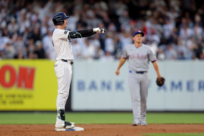 May 5, 2026; Bronx, New York, USA; New York Yankees left fielder Cody Bellinger (35) celebrates his RBI double against the Texas Rangers during the first inning at Yankee Stadium. Mandatory Credit: Brad Penner-Imagn Images