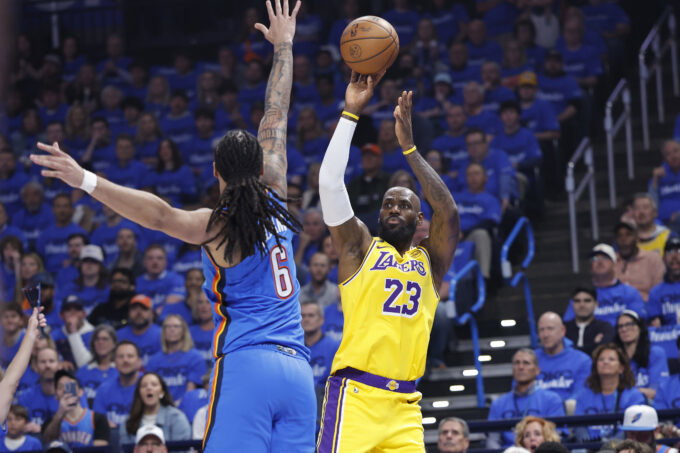 May 5, 2026; Oklahoma City, Oklahoma, USA; Los Angeles Lakers forward LeBron James (23) shoots as Oklahoma City Thunder forward Jaylin Williams (6) defends in the first half during game one of the second round of the 2026 NBA Playoffs at Paycom Center. Mandatory Credit: Alonzo Adams-Imagn Images