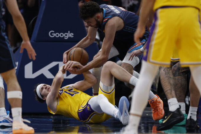 May 7, 2026; Oklahoma City, Oklahoma, USA; Oklahoma City Thunder center Chet Holmgren (7) steals the ball from Los Angeles Lakers guard Austin Reaves (15) in the second half during game two of the second round of the 2026 NBA Playoffs at Paycom Center. Mandatory Credit: Alonzo Adams-Imagn Images