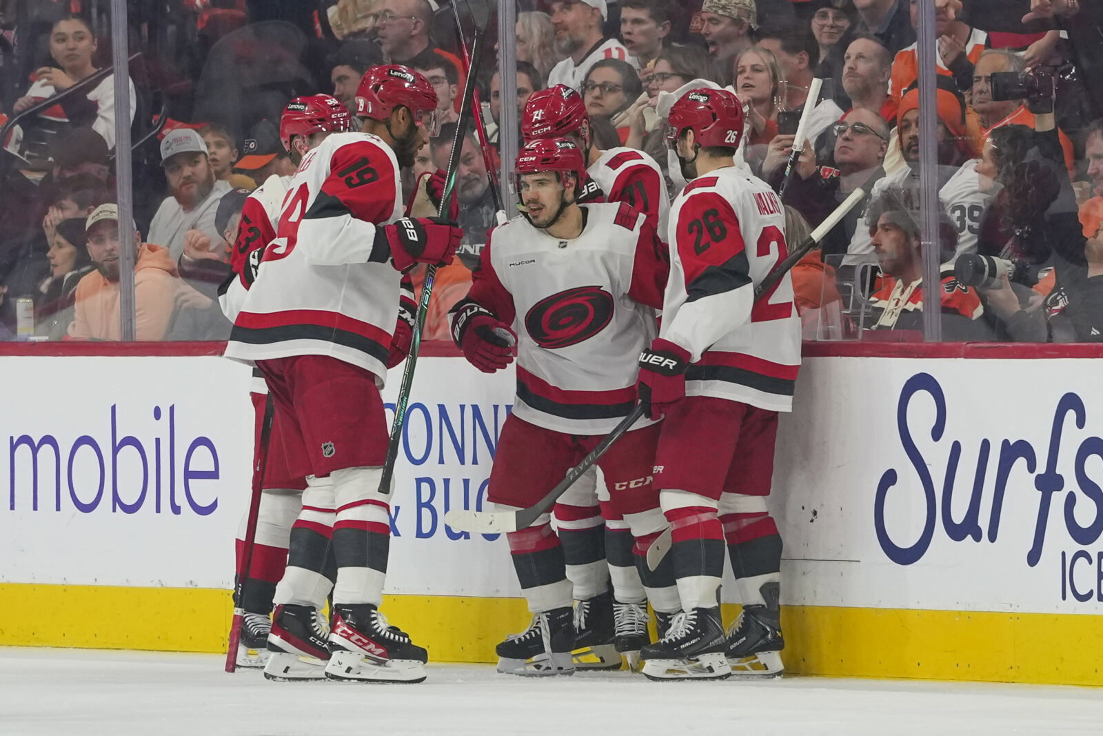 May 9, 2026; Philadelphia, Pennsylvania, USA; Carolina Hurricanes center Logan Stankoven (22) celebrates a goal with teammates against the Philadelphia Flyers in game four of the second round of the 2026 Stanely Cup Playoffs at Xfinity Mobile Arena. Mandatory Credit: James Lang-Imagn Images